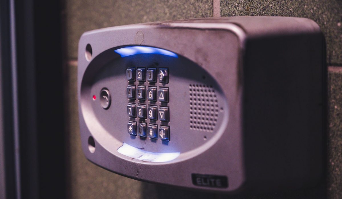 An illuminated keypad on a wall