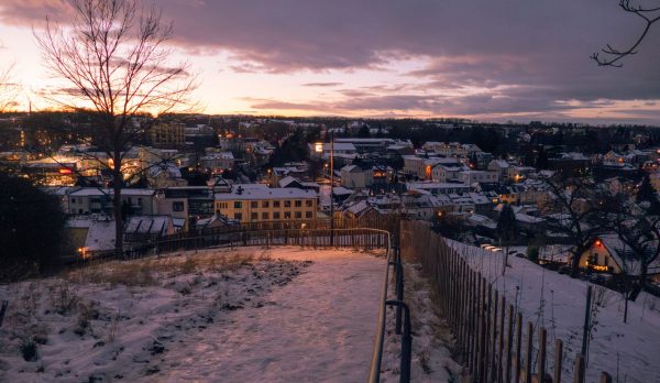 A snow-covered village at twilight