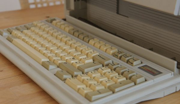 A vintage computer keyboard with yellowed keys